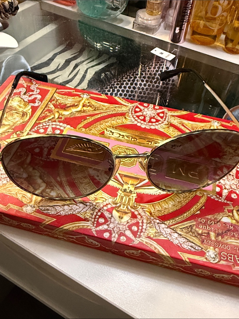 Coach Gold Metal Oval Sunglasses with Black Lenses
